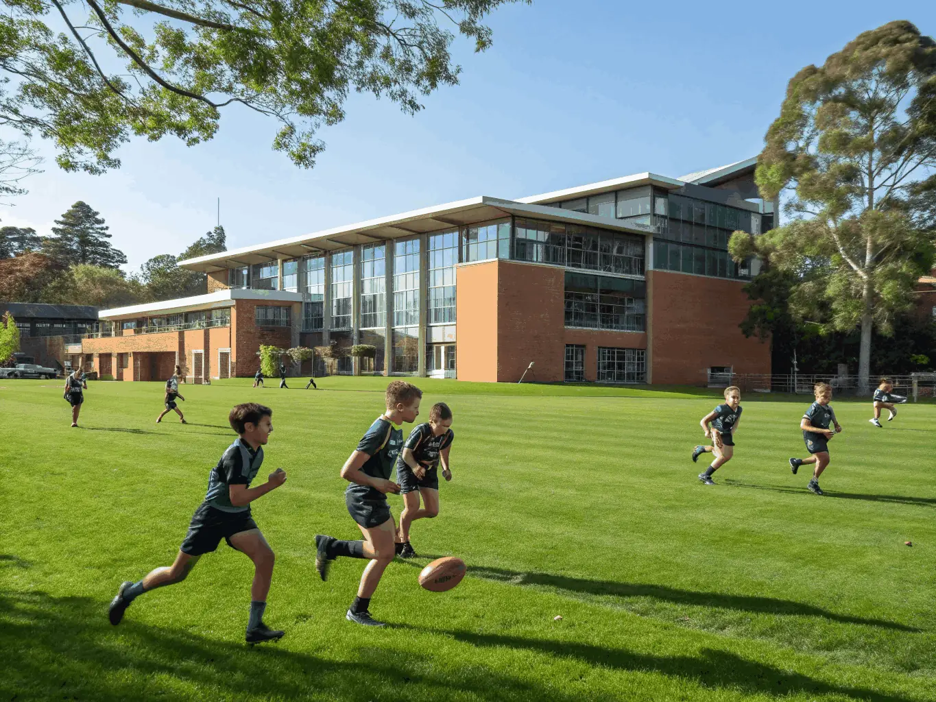 A vibrant image of young football players participating in a training session, showcasing their enthusiasm and teamwork.